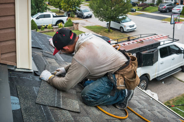 Professional Metal Roofing technician working in Bybee, TN